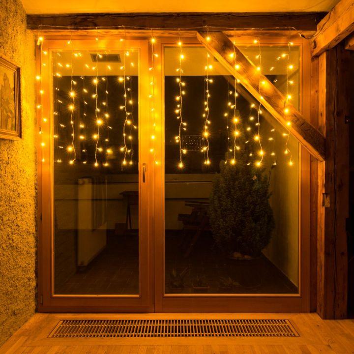 Levně DecoLED LED světelná záclona HOBBY LINE - 2x1m, teple bílá, 100 diod